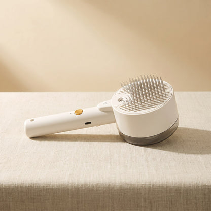 Self-Cleaning Pet Hair Remover Brush on a warm neutral background
