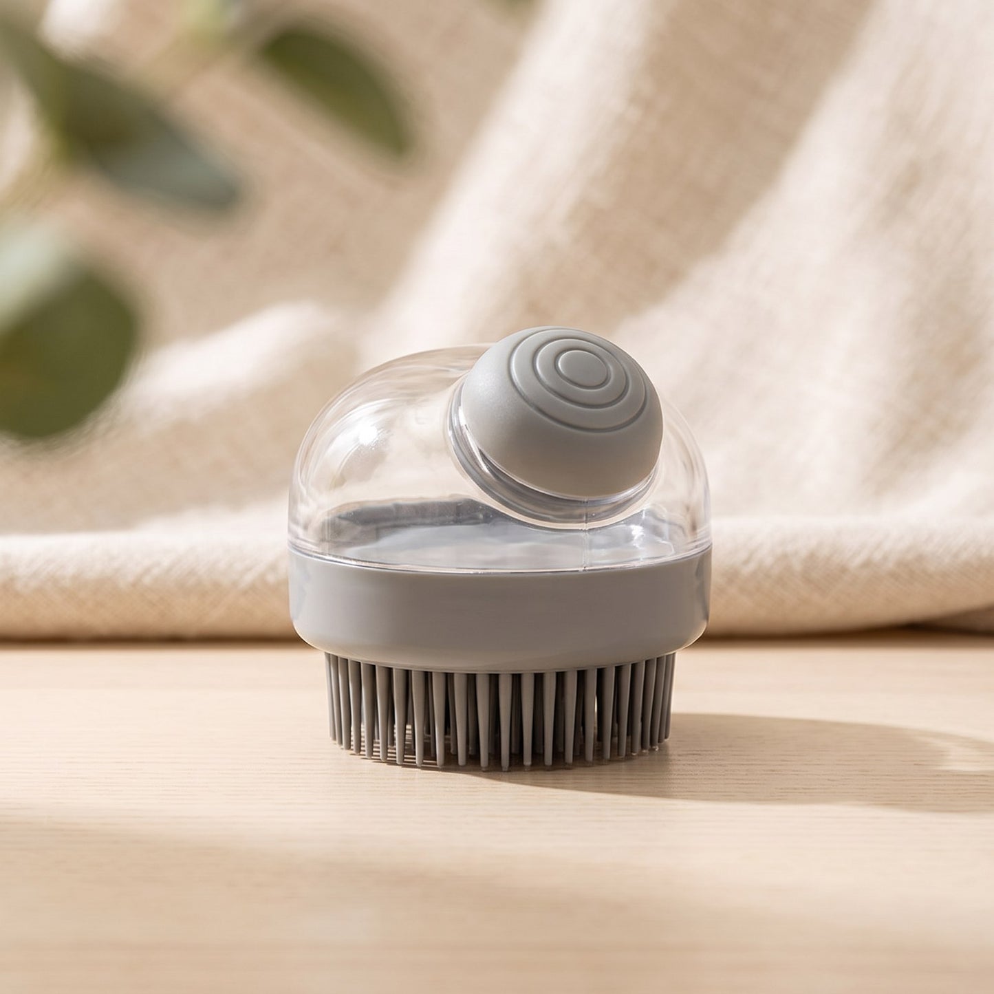 Silicone Pet Bath Brush Dispenser on a warm neutral background